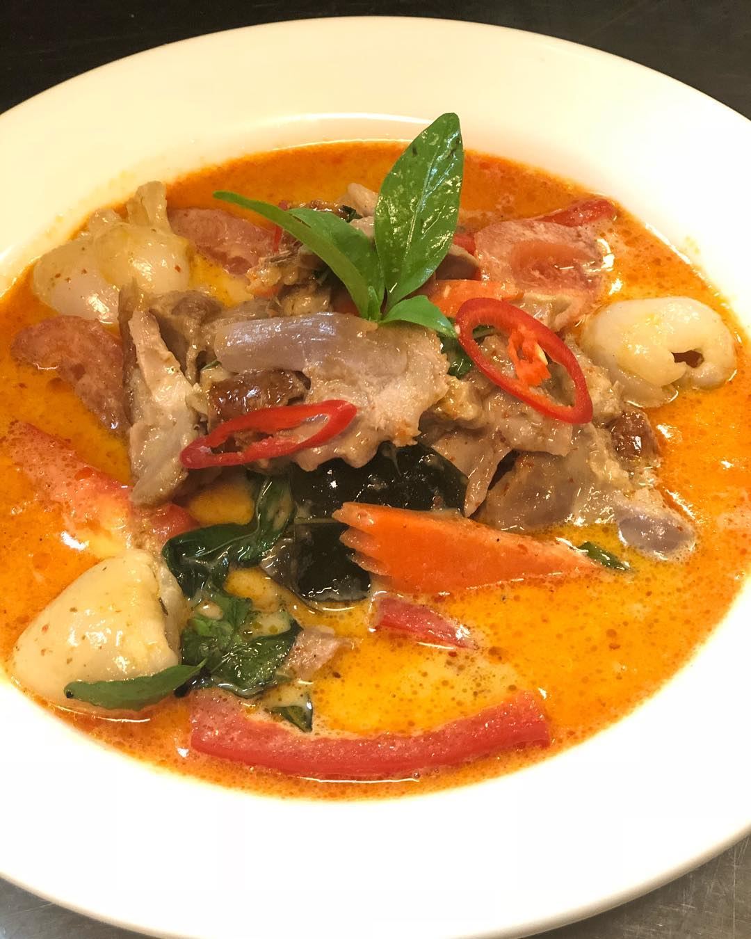 Red duck curry with basil and chilli